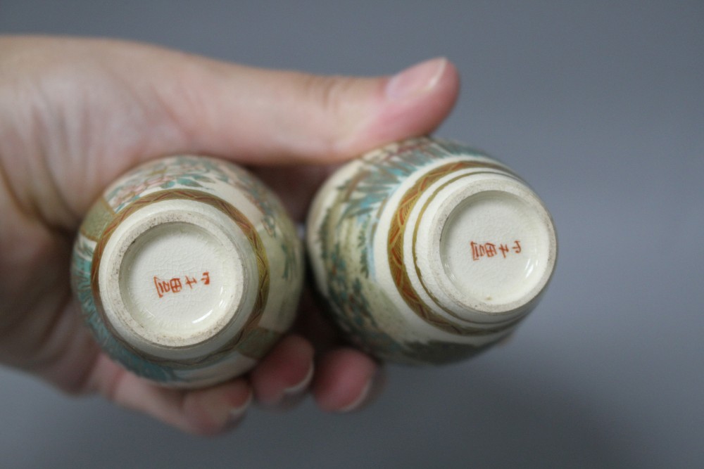 A pair of small Satsuma baluster vases, decorated with birds and flowers, signed, height 8.5cm